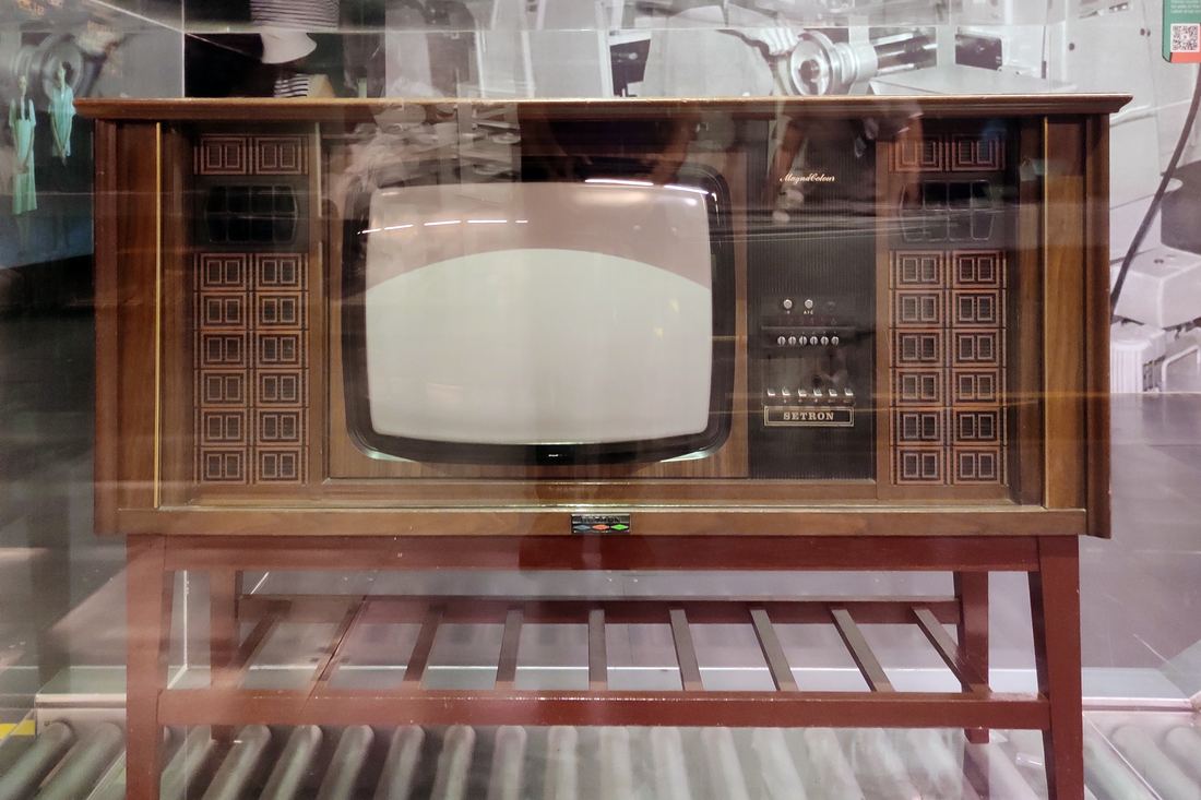 A wooden cabinet television set from the 1960s in a museum